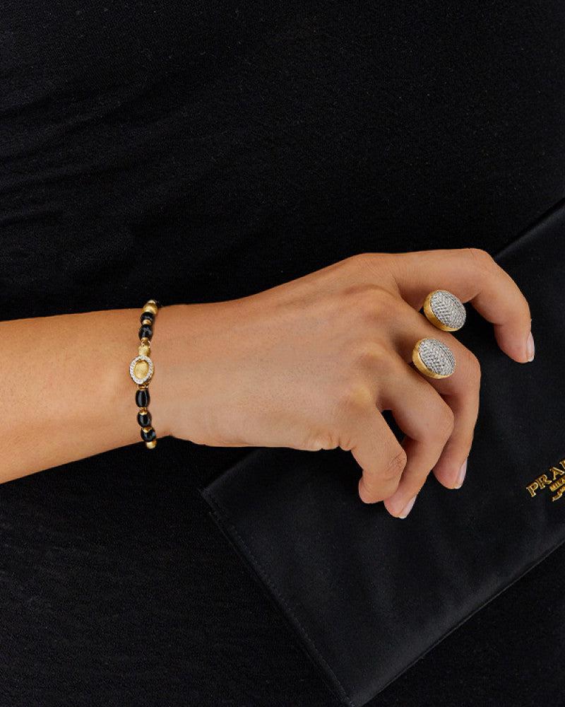 DANCING "IVY" BLACK ONYX BRACELET WITH GOLD BOULES AND DIAMONDS